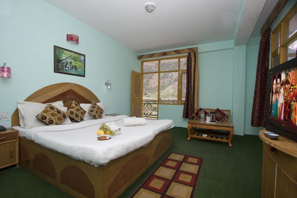 Hotel Ocean Inn Manāli Стая снимка